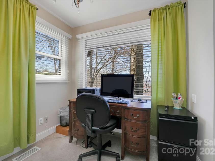 2600 Connestee Trail, Brevard, NC 28712.  MLS# CAR4235647, YatesRealty ID 20535. Primary bedroom office/sitting