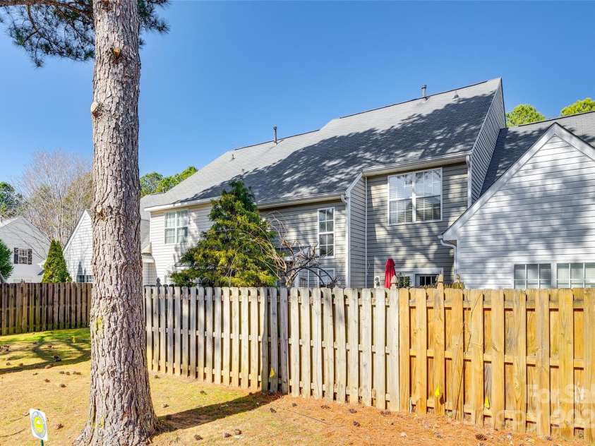 8929 Bryant Field Circle, Charlotte, NC 28277.  MLS# CAR4226724, YatesRealty ID 2054. Common area behind fence