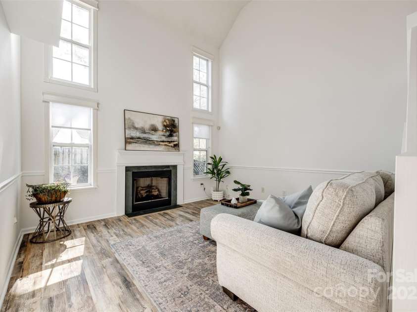 8929 Bryant Field Circle, Charlotte, NC 28277.  MLS# CAR4226724, YatesRealty ID 2054. Two story great room with gas fireplace and custom blinds