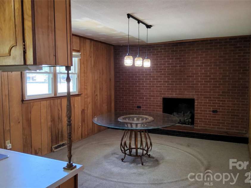 113 Kings Drive, Forest City, NC 28043.  MLS# CAR4378463, YatesRealty ID 20545. DINING ROOM & FIREPLACE~~