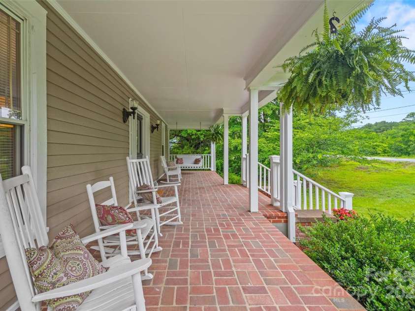 4569 Edgeland Road, Edgemoor, SC 29712.  MLS# CAR4258420, YatesRealty ID 20545. Rocking Chair Front Porch