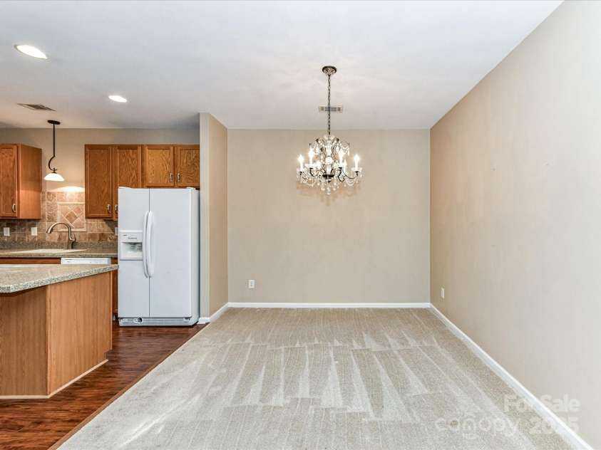 10727 Ryan Courtney Square, Mint Hill, NC 28227.  MLS# CAR4252287, YatesRealty ID 20546. Beautiful dining area ready for family celebrations!