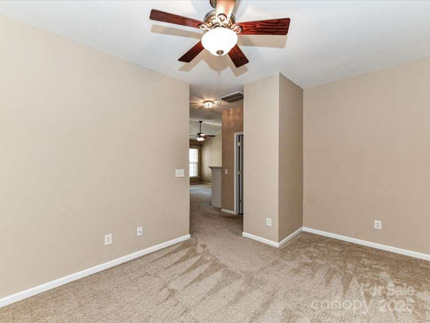 10727 Ryan Courtney Square, Mint Hill, NC 28227.  MLS# CAR4252287, YatesRealty ID 20546. Reverse view of the flex space looking into the great room area