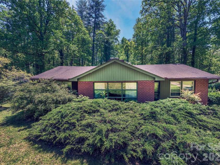 3004 Kanuga Road, Hendersonville, NC 28739.  MLS# CAR4380195, YatesRealty ID 20550. 