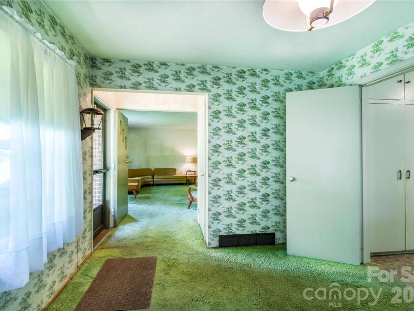3004 Kanuga Road, Hendersonville, NC 28739.  MLS# CAR4380195, YatesRealty ID 20550. 