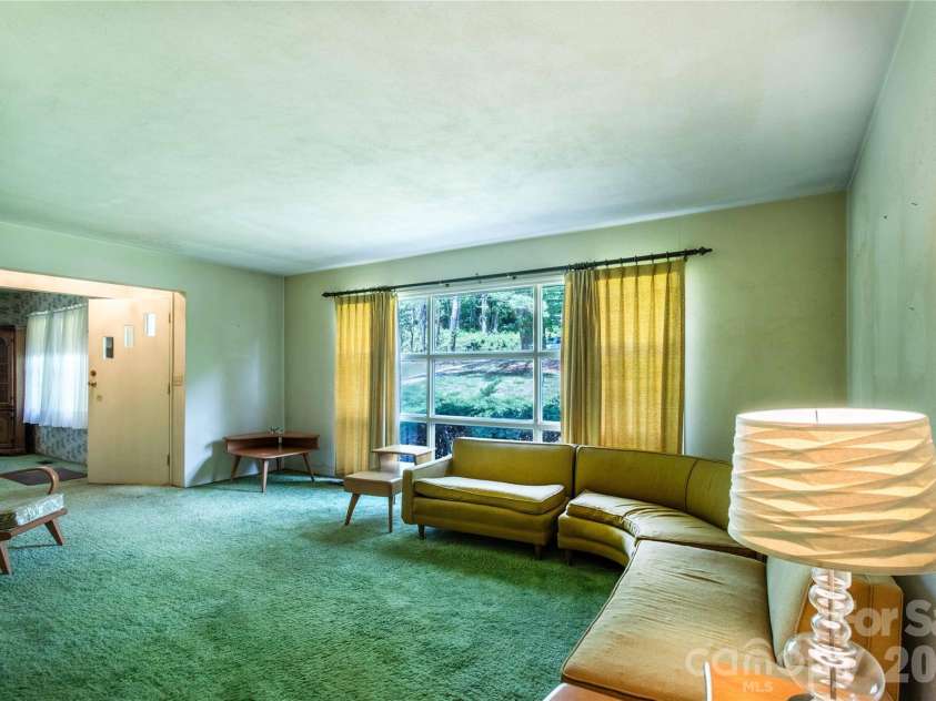 3004 Kanuga Road, Hendersonville, NC 28739.  MLS# CAR4380195, YatesRealty ID 20550. 