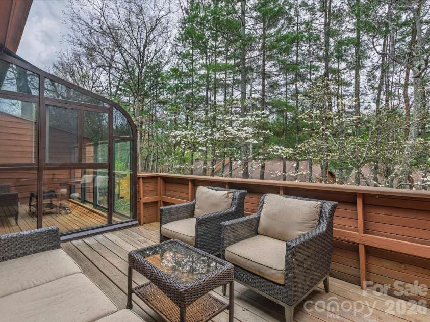 504 Woodfield Drive, Asheville, NC 28803.  MLS# CAR4365085, YatesRealty ID 20553. Main level deck - ready for summer relaxation