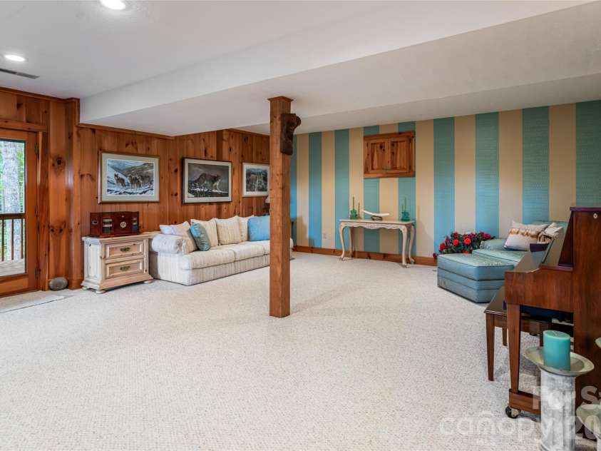 163 Tweetys Knoll, Burnsville, NC 28714.  MLS# CAR4281512, YatesRealty ID 2056. Lower level recc/bonus room
