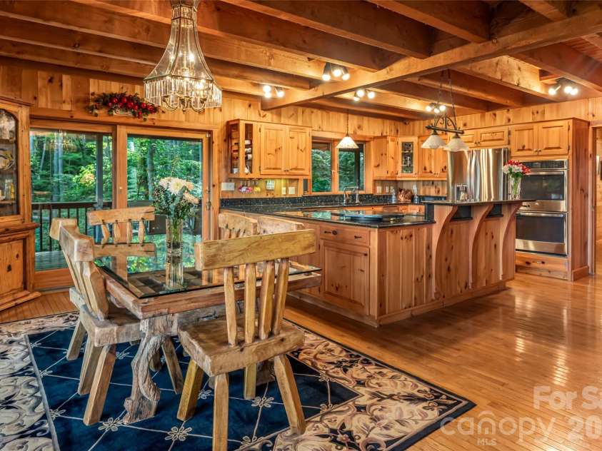 163 Tweetys Knoll, Burnsville, NC 28714.  MLS# CAR4281512, YatesRealty ID 2056. Open concept living and dining