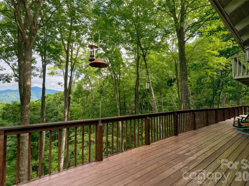 163 Tweetys Knoll, Burnsville, NC 28714.  MLS# CAR4281512, YatesRealty ID 2056. Over 3000 sqft of decking! 