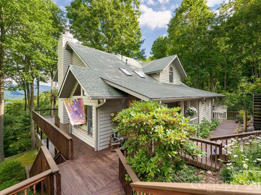 163 Tweetys Knoll, Burnsville, NC 28714.  MLS# CAR4281512, YatesRealty ID 2056. Walkway between garage and main home