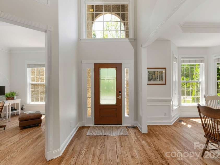 3017 Chisholm Court, Waxhaw, NC 28173.  MLS# CAR4234747, YatesRealty ID 20561. 2 story grand foyer opens to dining room and formal living room- utilized here as a main level home office.
