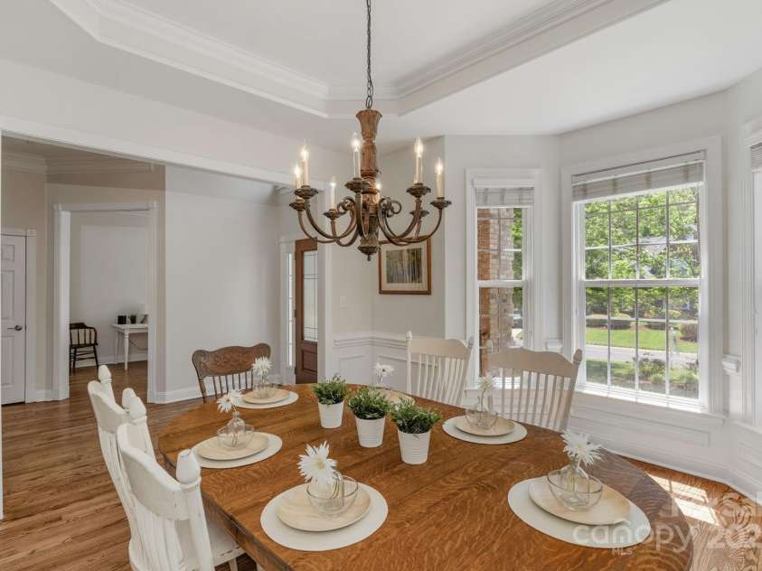 3017 Chisholm Court, Waxhaw, NC 28173.  MLS# CAR4234747, YatesRealty ID 20561. Formal dining room with trey ceiling, wall trim and huge bay window!!
