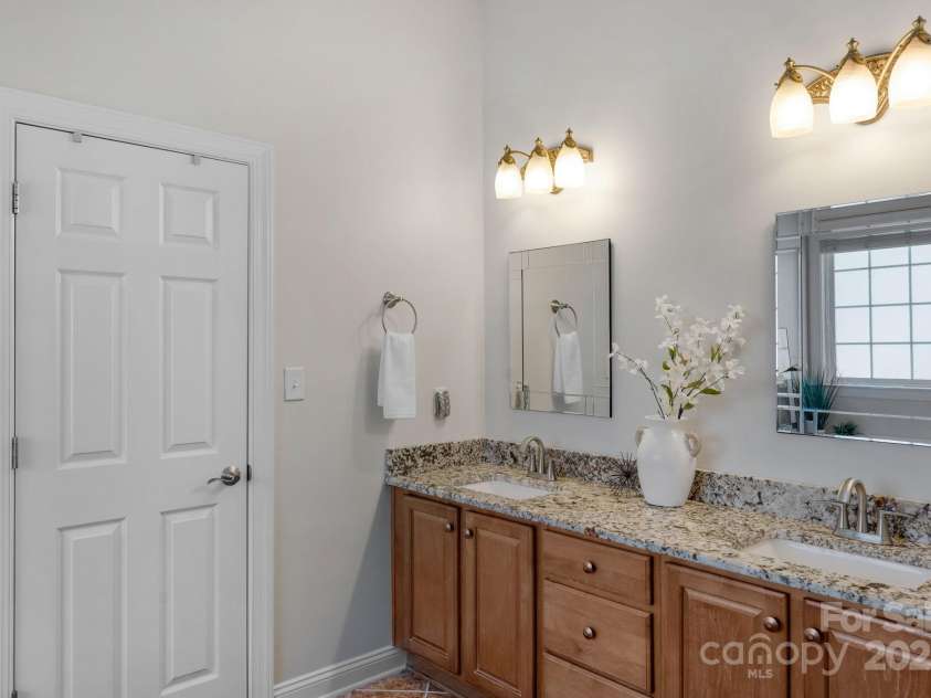 3017 Chisholm Court, Waxhaw, NC 28173.  MLS# CAR4234747, YatesRealty ID 20561. Primary bath with dual vanities