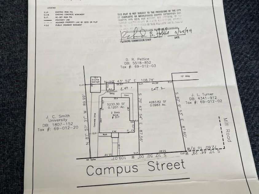 317 Campus Street, Charlotte, NC 28216.  MLS# CAR4270154, YatesRealty ID 20564. Survey done in 1994 to subdivide lot but seller decided not to divide the lot.  Lot can still be subdivided per City of Charlotte. Needs need survey done and recorded in order to do so.