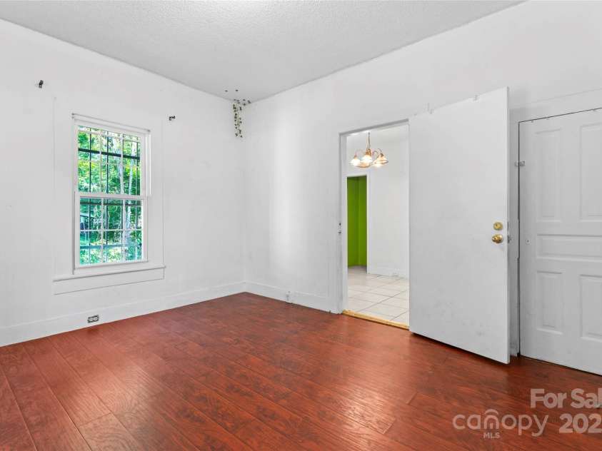 317 Campus Street, Charlotte, NC 28216.  MLS# CAR4329279, YatesRealty ID 20564. Bedroom 3 off of Dining Area could be used as a Formal Dining Room