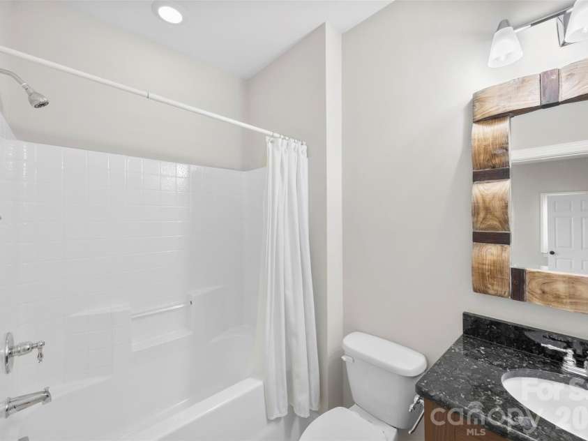 8624 Robbins Crescent Drive, Cornelius, NC 28031.  MLS# CAR4410622, YatesRealty ID 20564. First floor laundry connects to primary closet