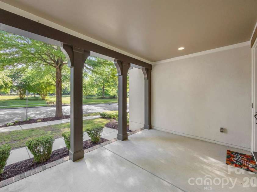 8624 Robbins Crescent Drive, Cornelius, NC 28031.  MLS# CAR4410622, YatesRealty ID 20564. Virtually staged covered deck
