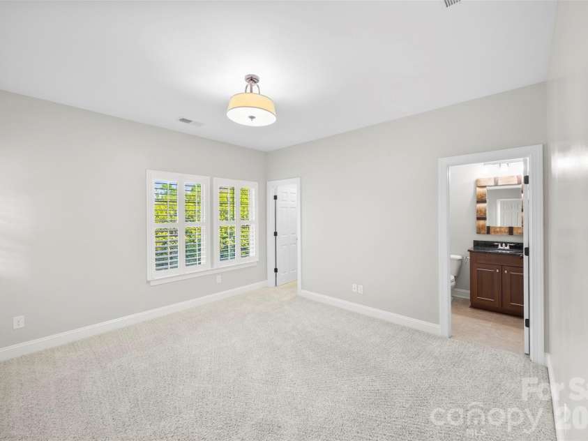 8624 Robbins Crescent Drive, Cornelius, NC 28031.  MLS# CAR4410622, YatesRealty ID 20564. Virtually staged ensuite bath.