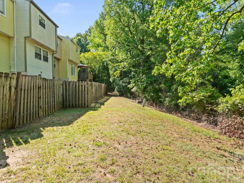 7344 Pebblestone Drive, Charlotte, NC 28212.  MLS# CAR4378230, YatesRealty ID 20570. Common Area Behind Unit