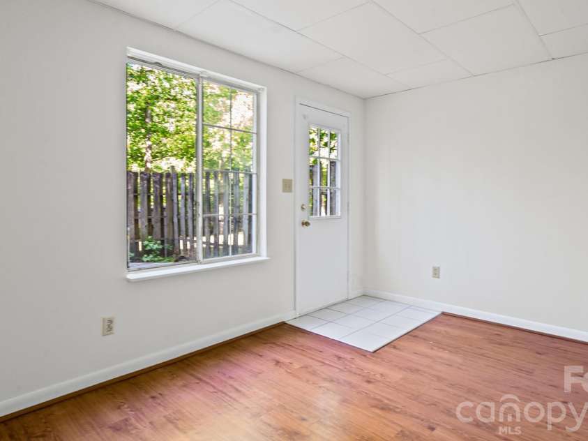 7344 Pebblestone Drive, Charlotte, NC 28212.  MLS# CAR4378230, YatesRealty ID 20570. Finished Walk Out Basement