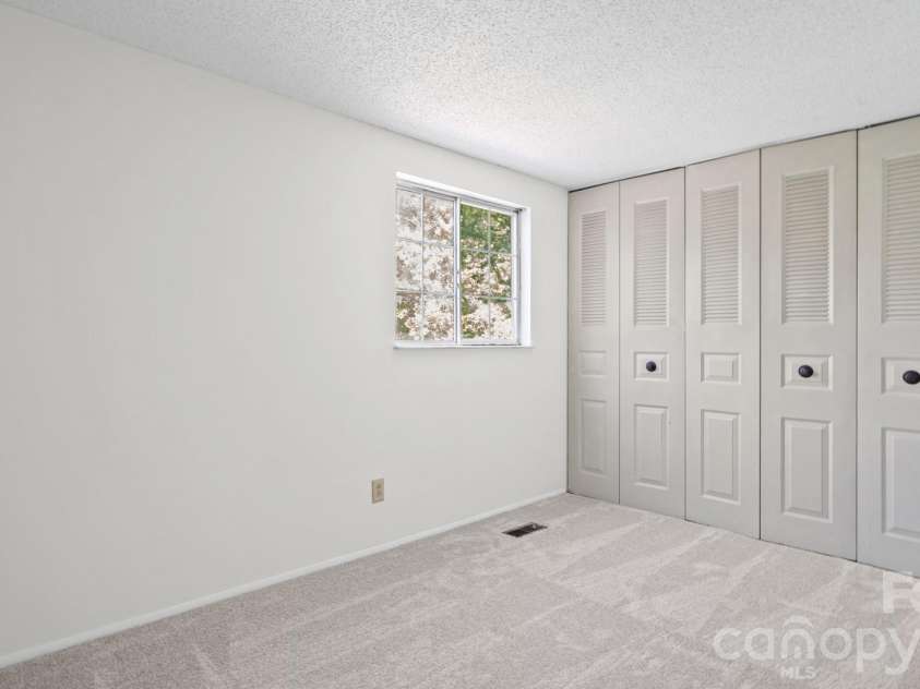 7344 Pebblestone Drive, Charlotte, NC 28212.  MLS# CAR4378230, YatesRealty ID 20570. Large Second Bedroom and Closets