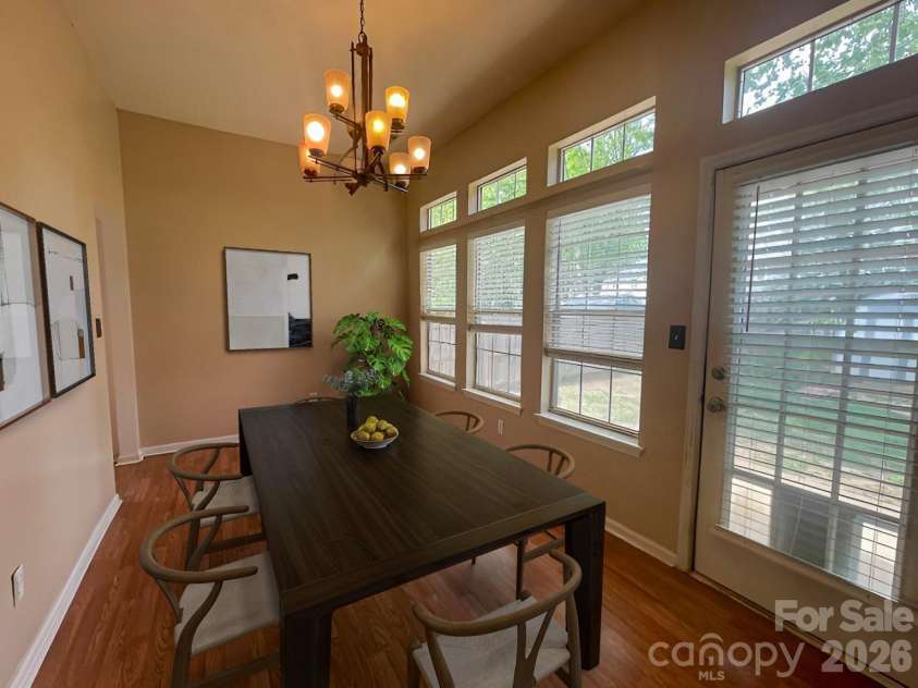 8418 Red Cypress Court, Charlotte, NC 28216.  MLS# CAR4379114, YatesRealty ID 20571. Dining Room (virtually staged)