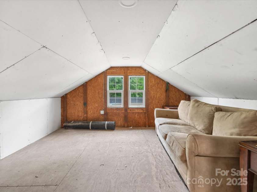 195 Bluebird Lane, Salisbury, NC 28146.  MLS# CAR4259402, YatesRealty ID 20581. Up stairs white garage
