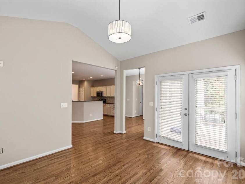 7934 Harbor Ridge Court, Denver, NC 28037.  MLS# CAR4374308, YatesRealty ID 20581. The sunroom has direct access to the large back deck and flat backyard.