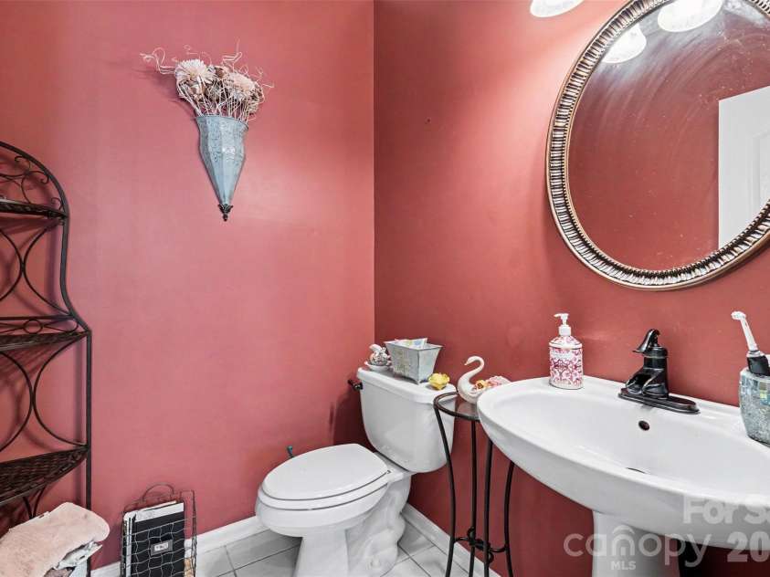 153 Castleton Drive, Mooresville, NC 28117.  MLS# CAR4364849, YatesRealty ID 20592. Main level powder room.