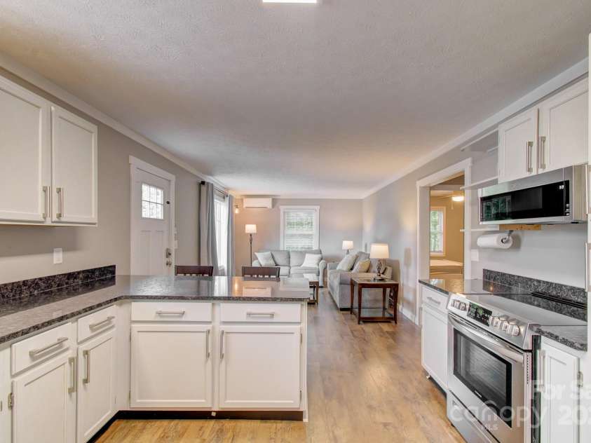 180 Ellerslie Acre None, Hendersonville, NC 28739.  MLS# CAR4270552, YatesRealty ID 20594. Kitchen of 2nd living quarters