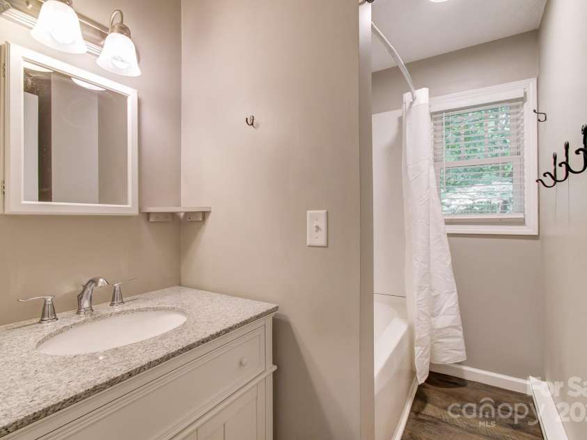 180 Ellerslie Acre None, Hendersonville, NC 28739.  MLS# CAR4270552, YatesRealty ID 20594. Primary suite of primary home