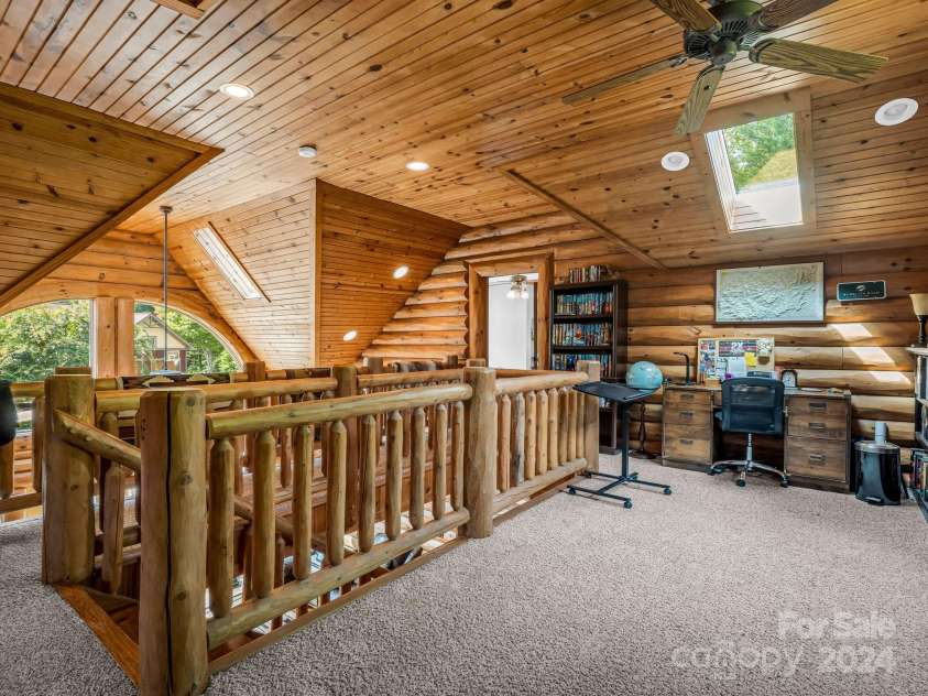 181 Highland Heights, Lake Lure, NC 28746.  MLS# CAR4183950, YatesRealty ID 206. Loft library