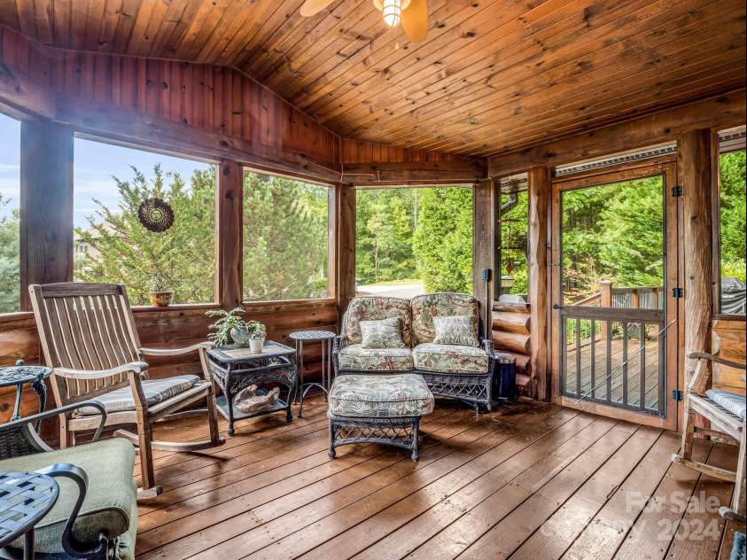 181 Highland Heights, Lake Lure, NC 28746.  MLS# CAR4183950, YatesRealty ID 206. Screen Porch off dining