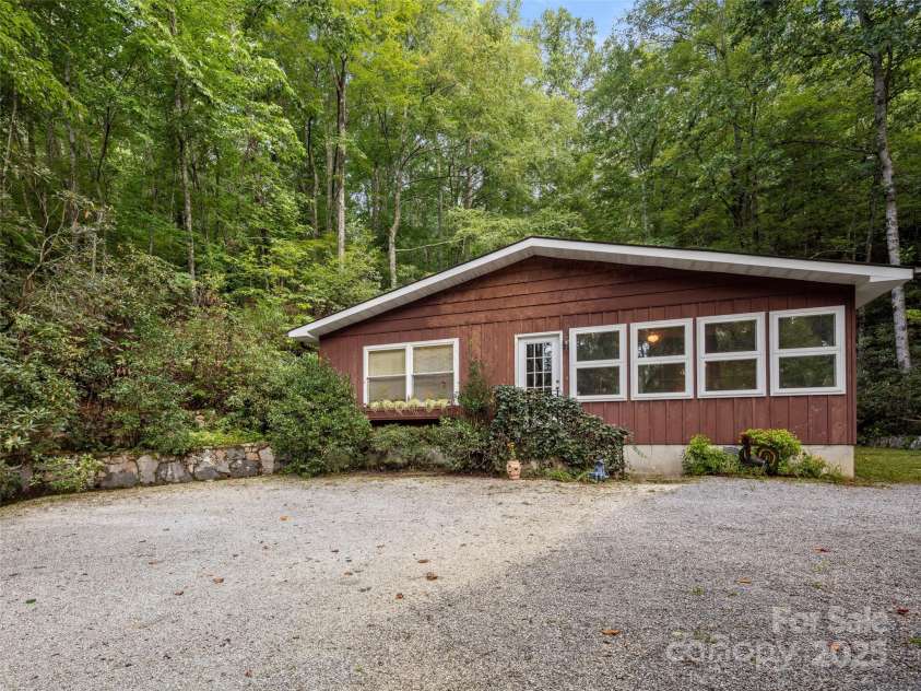 812 Crab Creek Road, Hendersonville, NC 28739.  MLS# CAR4313649, YatesRealty ID 206. Quaint mountain cottage