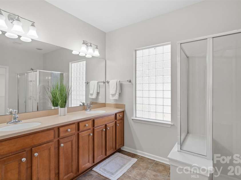 10471 Scotland Avenue, Fort Mill, SC 29707.  MLS# CAR4347664, YatesRealty ID 2060. Owner's Bath