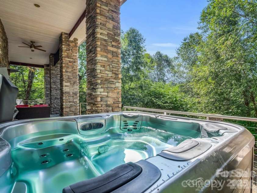 167 Trails End, Lake Lure, NC 28746.  MLS# CAR4245504, YatesRealty ID 2060. Hot tub on upper deck