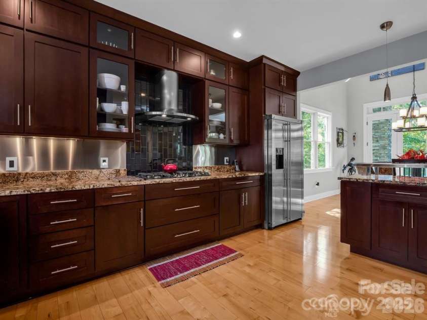 167 Trails End, Lake Lure, NC 28746.  MLS# CAR4245504, YatesRealty ID 2060. Open to Dining & GR