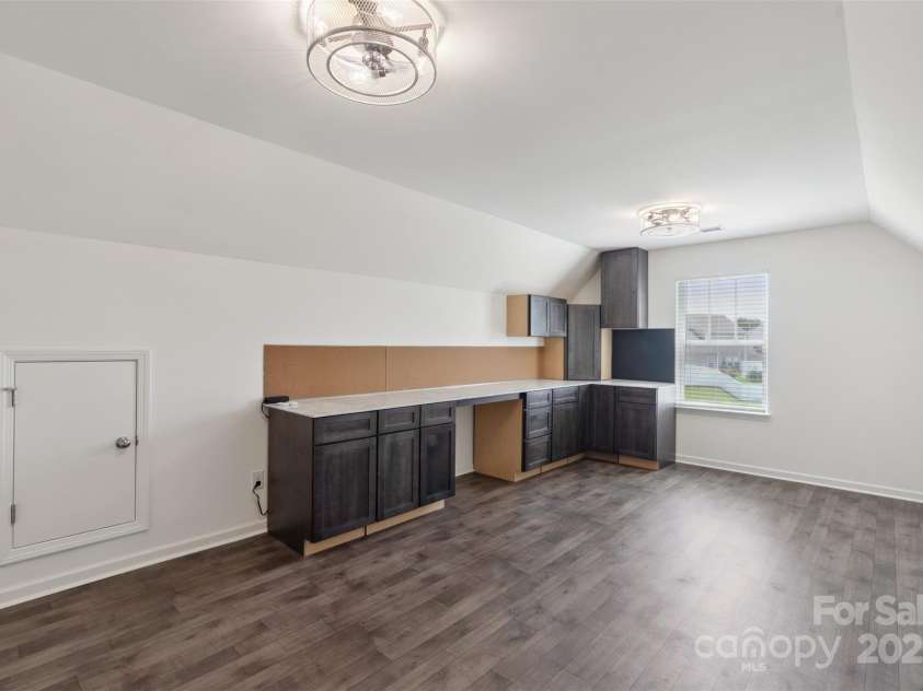 117 Carmine Court, Troutman, NC 28166.  MLS# CAR4269982, YatesRealty ID 20601. Generous bonus room with built-in desk