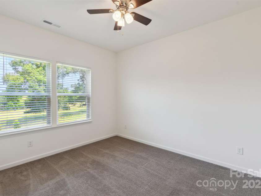 117 Carmine Court, Troutman, NC 28166.  MLS# CAR4269982, YatesRealty ID 20601. Primary bedroom #1 on the main level