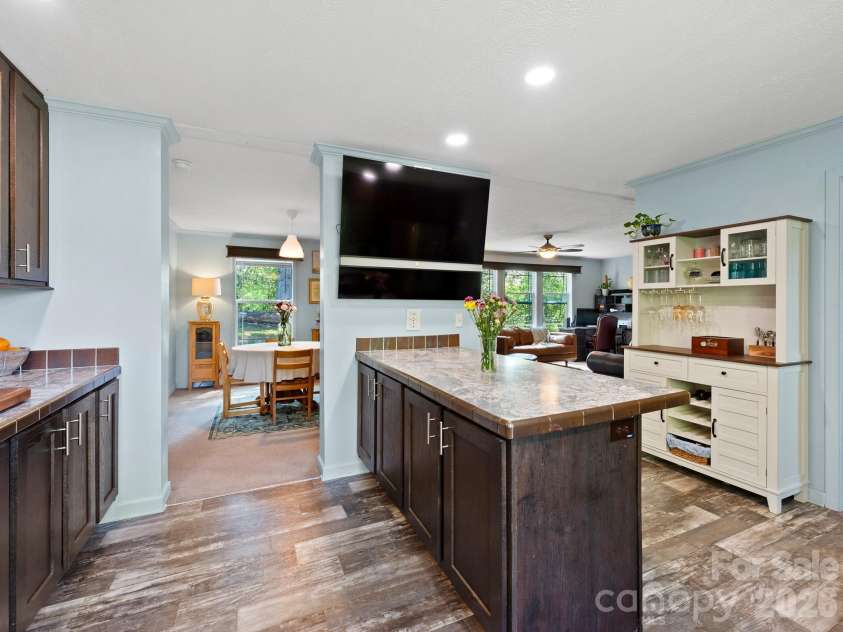191 Posey Griffin Drive, Mars Hill, NC 28754.  MLS# CAR4374358, YatesRealty ID 20601. Enjoy your time in the kitchen while watching your favorite tv show or movie! Place your own TV and sound equipment, of course!
