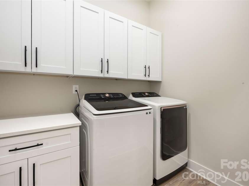 1027 Masefield Avenue, Matthews, NC 28105.  MLS# CAR4350360, YatesRealty ID 20602. Main Level Laundry
