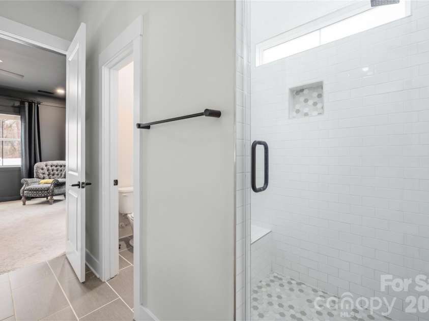 1027 Masefield Avenue, Matthews, NC 28105.  MLS# CAR4350360, YatesRealty ID 20602. Primary bath