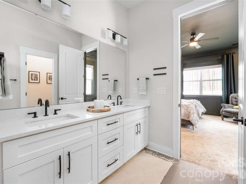 1027 Masefield Avenue, Matthews, NC 28105.  MLS# CAR4350360, YatesRealty ID 20602. Primary bath