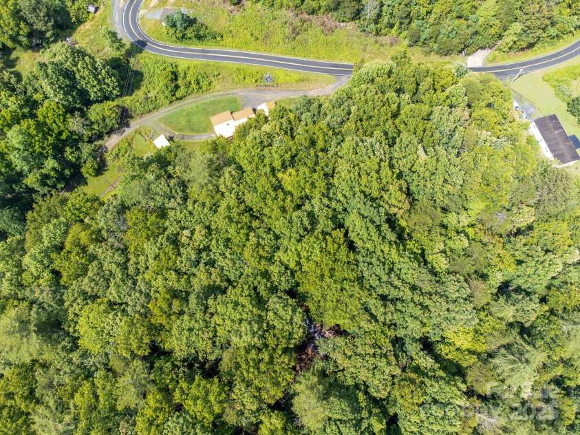 691 Sandy Bottom Road, Marshall, NC 28753.  MLS# CAR4272745, YatesRealty ID 20602. Drone of Home