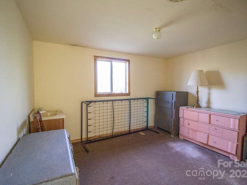 691 Sandy Bottom Road, Marshall, NC 28753.  MLS# CAR4272745, YatesRealty ID 20602. First Bedroom