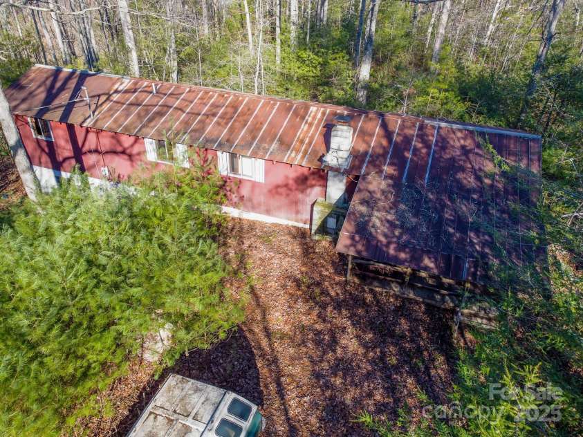 691 Sandy Bottom Road, Marshall, NC 28753.  MLS# CAR4272745, YatesRealty ID 20602. Home aerial