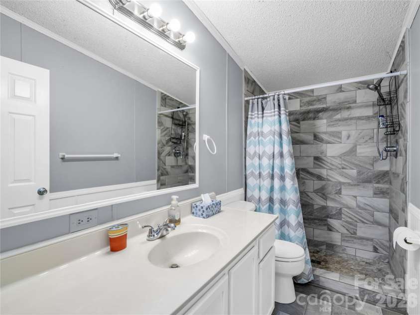 48 Laurel Cove Road, Leicester, NC 28748.  MLS# CAR4364503, YatesRealty ID 20603. 