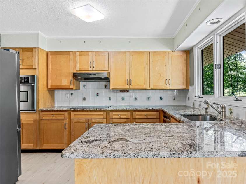 1026 Campbell Drive, Pisgah Forest, NC 28768.  MLS# CAR4270765, YatesRealty ID 20610. 