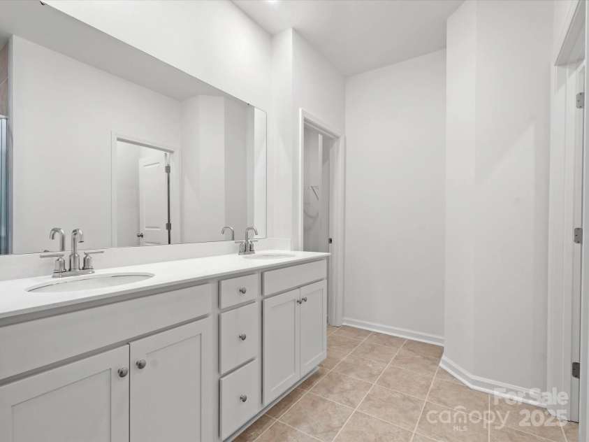 1071 Bull Dog Lane, Wingate, NC 28174.  MLS# CAR4264655, YatesRealty ID 20613. Representative Photo*Primary Bath